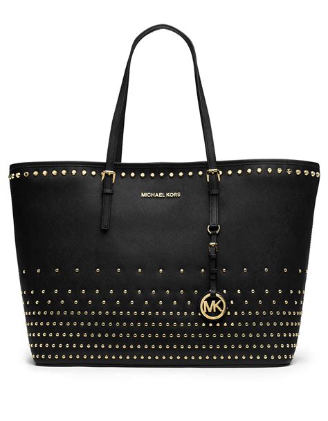 michael kors jet set stud large tz tote|michael kors bag with airplanes.